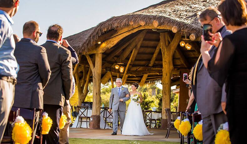 bride starts down aisle from Watering Holes