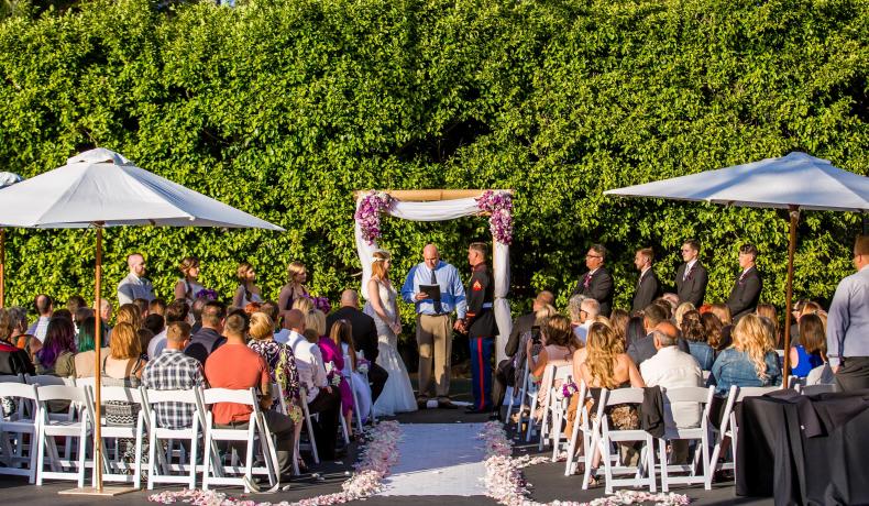 True Photography wedding ceremony with guests