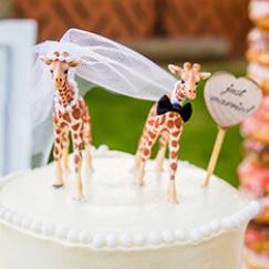 True Photography Giraffe wedding cake toppers.