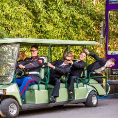 True Photography groomsmen clowning on cart